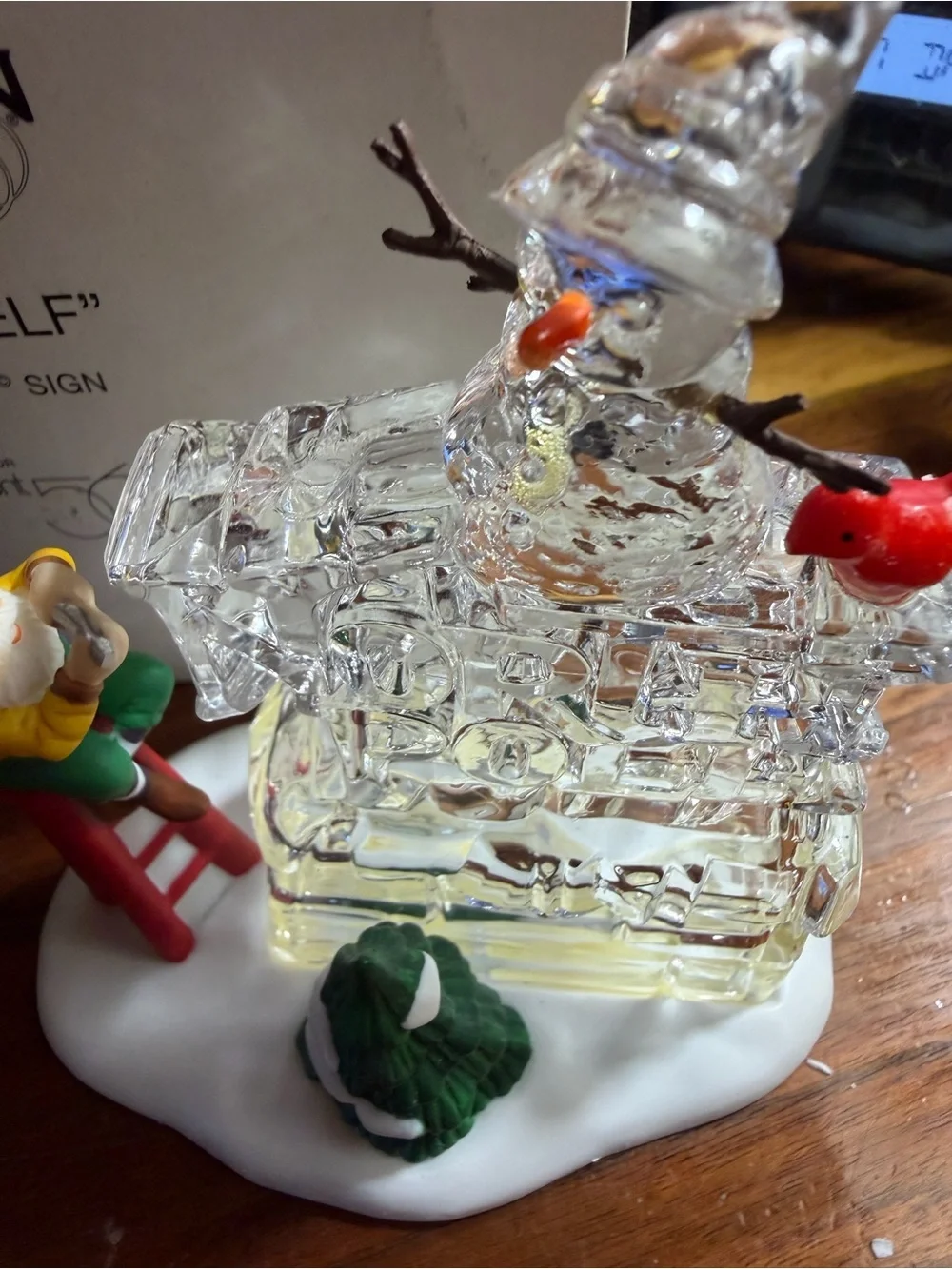 Department 56 A busy elf Sculpture with Holiday Figurines